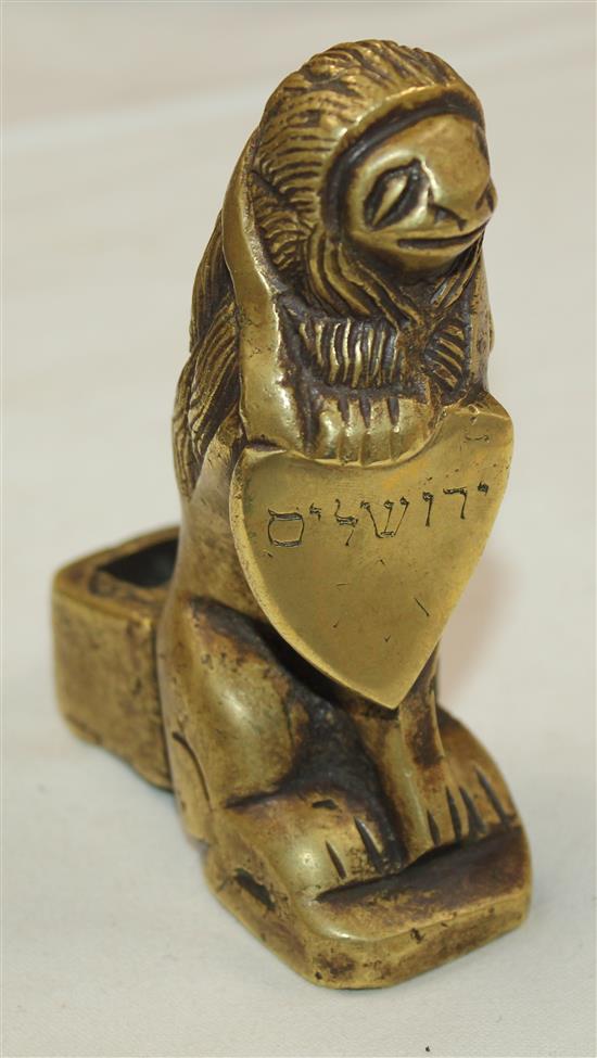 Judaica. A Flemish or German Gothic brass candelabra support, Dinant c.1300, height 3.75in.